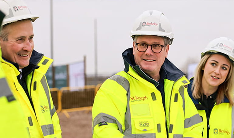 A photograph of the Prime Minister with people who work at Eastbrook Village