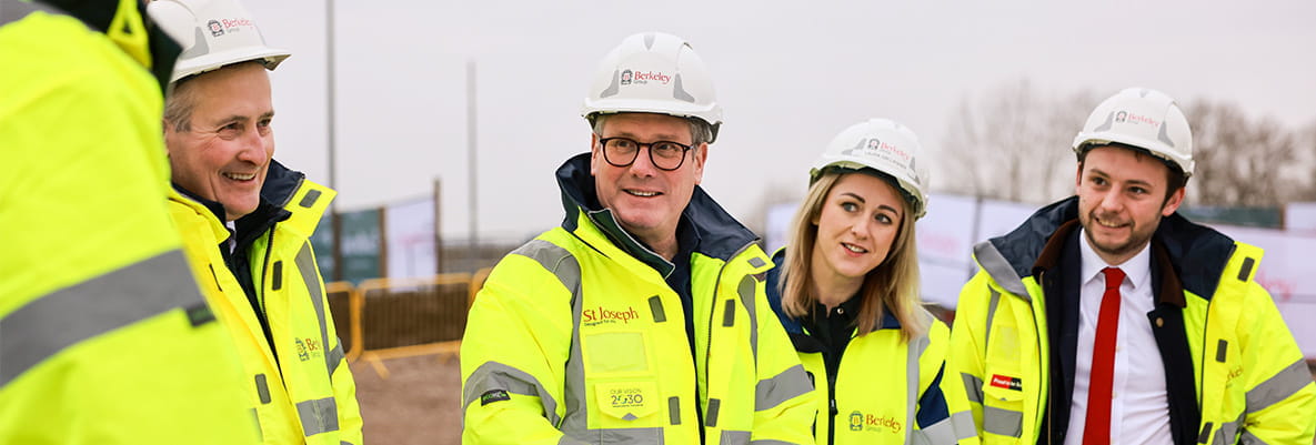 A photograph of the Prime Minister with people who work at Eastbrook Village